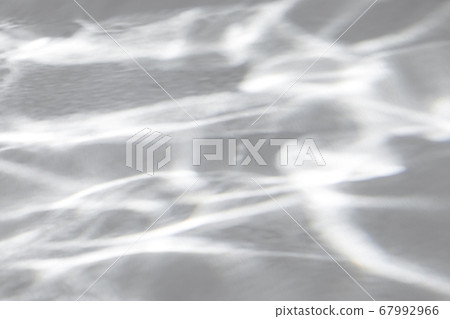 shadow and light caustic effect on a white wall shadow and light caustic effect on a white wall 67992966