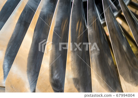 Close-up of jet engine fan blades 67994804