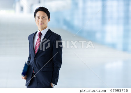 Male businessman smile 67995736