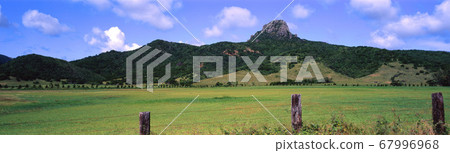 Pasture and mountain scenery of the farm 67996968