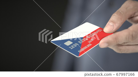 Man gives plastic bank card with printed flag of the Czech Republic, close-up shot. Fictional numbers 67997166