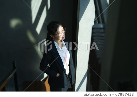 Business woman, thinking Business woman, thinking 67997438