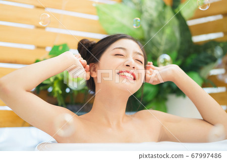 Woman, bathroom, relax Woman, bathroom, relax 67997486