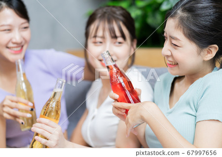 Women party, drinking 67997656