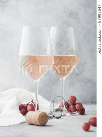 Glasses of pink rose homemade summer refreshing Glasses of pink rose homemade summer refreshing 67998647