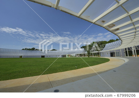 Sports ground lawn and light-transmitting glass buildings Sports ground lawn and light-transmitting glass buildings 67999206