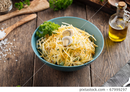 Russian salad wood grouse nest with potato chips 67999297