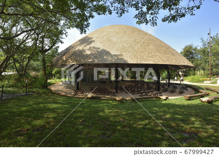 Round building exterior and park Round building exterior and park 67999427