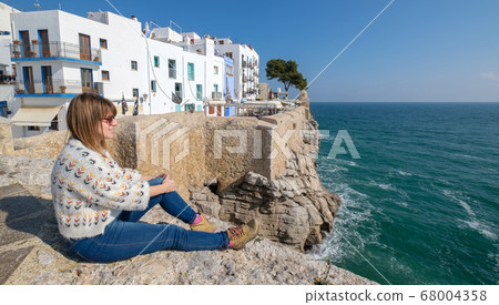 Mediterranean village on cliff by the sea 68004358