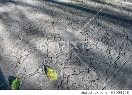 top view of stamped concrete pavement outdoor, boulders stones pattern, flooring exterior, decorative gray color and texture of cement paving 68004398