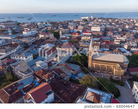 Aerial View on Old Slave Market in Anglican Cathedral at sunset time in Stone Town, Zanzibar, Tanzania 68004647