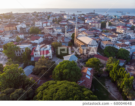 Aerial View on Old Slave Market in Anglican Cathedral at sunset time in Stone Town, Zanzibar, Tanzania 68004648