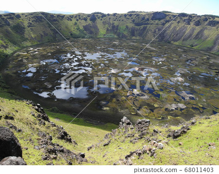 The crater of Ranokau volcano on Easter Island The crater of Ranokau volcano on Easter Island 68011403
