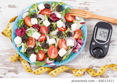 Glucometer with sugar level, centimeter and greek salad 68011411