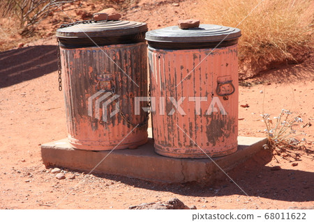 Twin trash bins with seasons that line up well 68011622