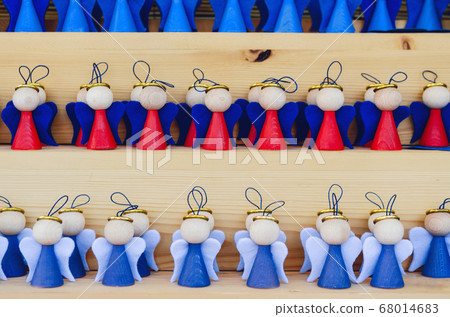 many wooden handmade angels on a christmas market many wooden handmade angels on a christmas market 68014683
