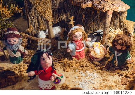 knitted figurines in a nativity scene 68015280