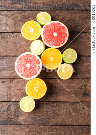 Fresh citruses on wooden table Fresh citruses on wooden table 68016202