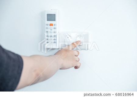 Hand press turn off the home light switch Concept of environmental preservation and energy saving Hand press turn off the home light switch Concept of environmental preservation and energy saving 68016964
