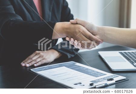 hands shake after business office executives are interviewing job applicants in the meeting room hands shake after business office executives are interviewing job applicants in the meeting room 68017026