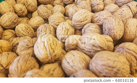 lots of brown inshell walnuts texture at the fresh vegan market lots of brown inshell walnuts texture at the fresh vegan market 68018116