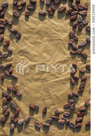 Cocoa flat lay concept with raw cocoa beans on Cocoa flat lay concept with raw cocoa beans on 68019400