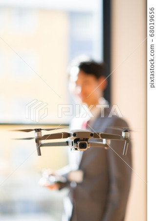 Drone business suit office male 1 man small number in-flight business negotiations maneuvering morning bright Drone business suit office male 1 man small number in-flight business negotiations maneuvering morning bright 68019656