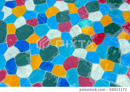 The walkway in the garden are paved with brightly colored stones and have just been cleaned by washing with water. The walkway in the garden are paved with brightly colored stones and have just been cleaned by washing with water. 68023172