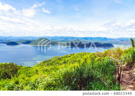 Beautiful scenery views of nature with a large reservoir above the Srinagarind Dam at Rai Ya Yam viewpoint in Si Sawat District, Kanchanaburi Thailand. 68023349