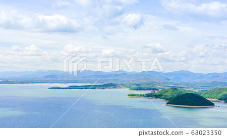 Beautiful scenery views of nature with a large reservoir above the Srinagarind Dam at Rai Ya Yam viewpoint in Si Sawat District, Kanchanaburi Thailand. Beautiful scenery views of nature with a large reservoir above the Srinagarind Dam at Rai Ya Yam viewpoint in Si Sawat District, Kanchanaburi Thailand. 68023350