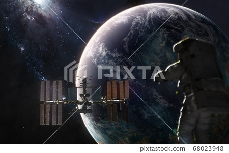 Exoplanet in deep space. Astronaut, space station, galaxy Exoplanet in deep space. Astronaut, space station, galaxy 68023948