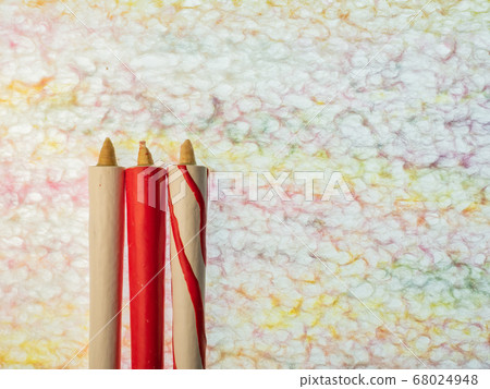 Iridescent Japanese paper background and Japanese candles and tops table photo for background/image Iridescent Japanese paper background and Japanese candles and tops table photo for background/image 68024948