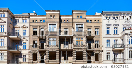Old tenement houses under renovation on Slaska Street in Szczecin, Poland. Old tenement houses under renovation on Slaska Street in Szczecin, Poland. 68027581