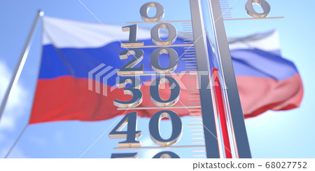 Minus 20 degrees centigrade on a thermometer measuring air temperature near flag of Russia. Cold weather forecast related 3D rendering Minus 20 degrees centigrade on a thermometer measuring air temperature near flag of Russia. Cold weather forecast related 3D rendering 68027752