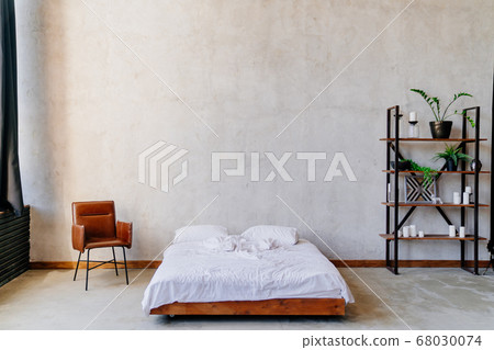 loft. bed, shelving and a chair near the gray wall loft. bed, shelving and a chair near the gray wall 68030074