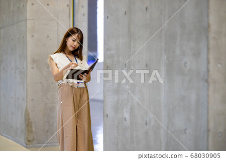 Business woman working for quality check 68030905