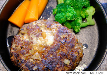 Skillet frying pan and homemade hamburger 68031203