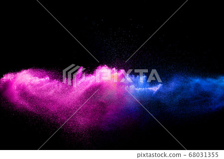 Pink blue dust particles splash on black background.Pink blue powder splash. Pink blue dust particles splash on black background.Pink blue powder splash. 68031355