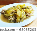 Stir fried pork filling, with pickled lettuce and oyster sauce in white plate 68035203