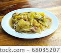 Stir fried pork filling, with pickled lettuce and oyster sauce in white plate 68035207