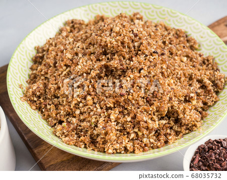 Nut, date, oats mix for vegan energy protein balls Nut, date, oats mix for vegan energy protein balls 68035732