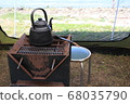 In the tent, a stove and a kettle 68035790