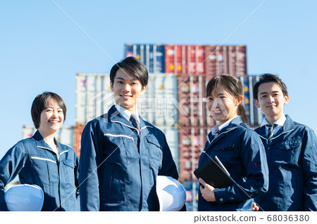 Workers Multiple men and women outdoors Workers Multiple men and women outdoors 68036380