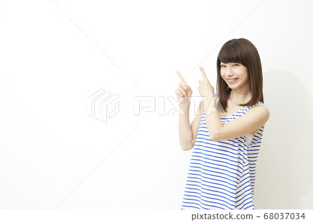 Female finger pointing Female finger pointing 68037034