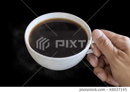 Top view hand man hold the white coffee cup wiht 68037145