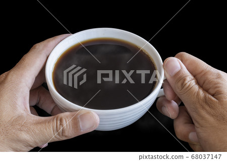 Two hand man hold the white coffee cup wiht hot 68037147