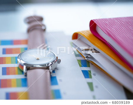 Business image · graph · document · notebook · woman Business image · graph · document · notebook · woman 68039189