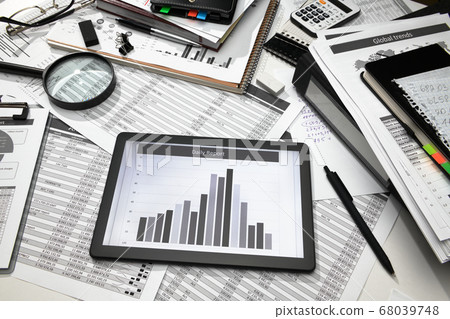 business office desk closeup - tablet computer 68039748