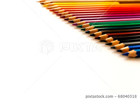 colored pencils on white background and wood chips colored pencils on white background and wood chips 68040318