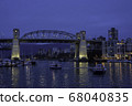 Seabass running over the sea and the night view of Vancouver 68040835